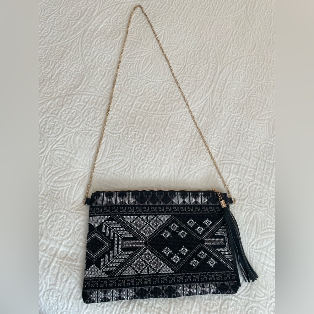 Black Vieta Handbag with Faux Leather back and Tassel Pull on Top Zipper Closure